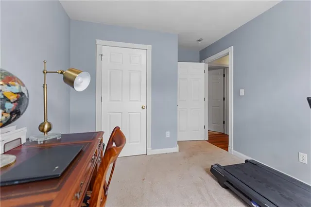 a workspace with furniture and window