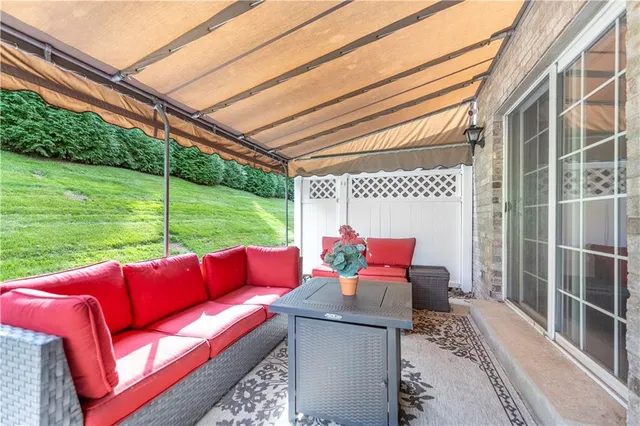 a view of yard with outdoor seating