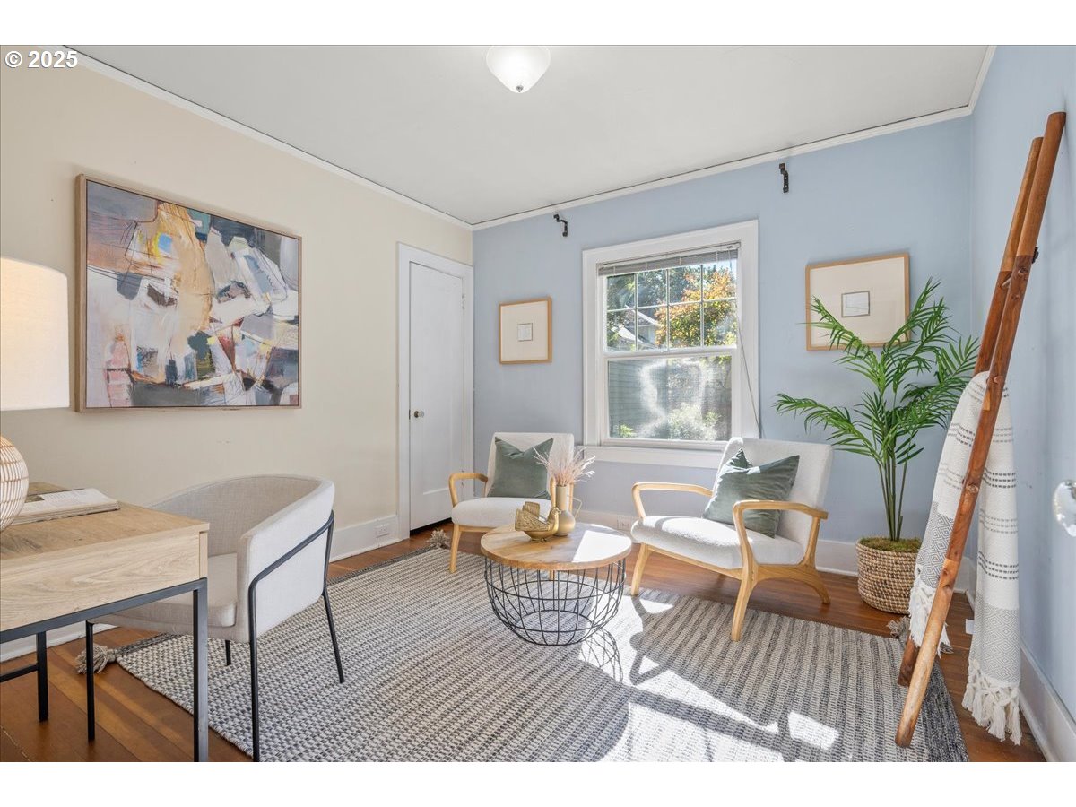 3448 Southeast Sherman Street Portland, OR 97214 - Photo 24 of 40 a living room with furniture and a window