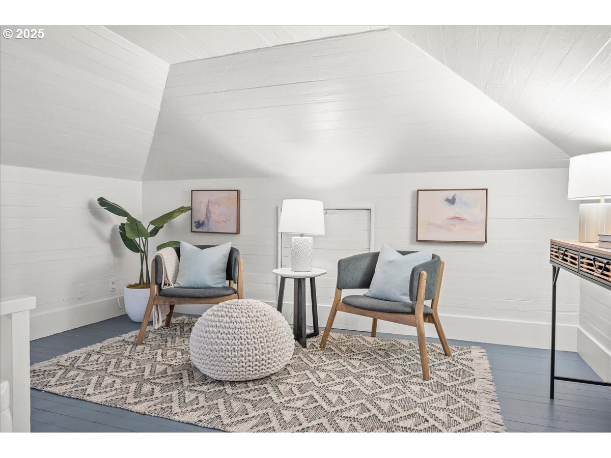 3448 Southeast Sherman Street Portland, OR 97214 - Photo 25 of 40 a living room with furniture