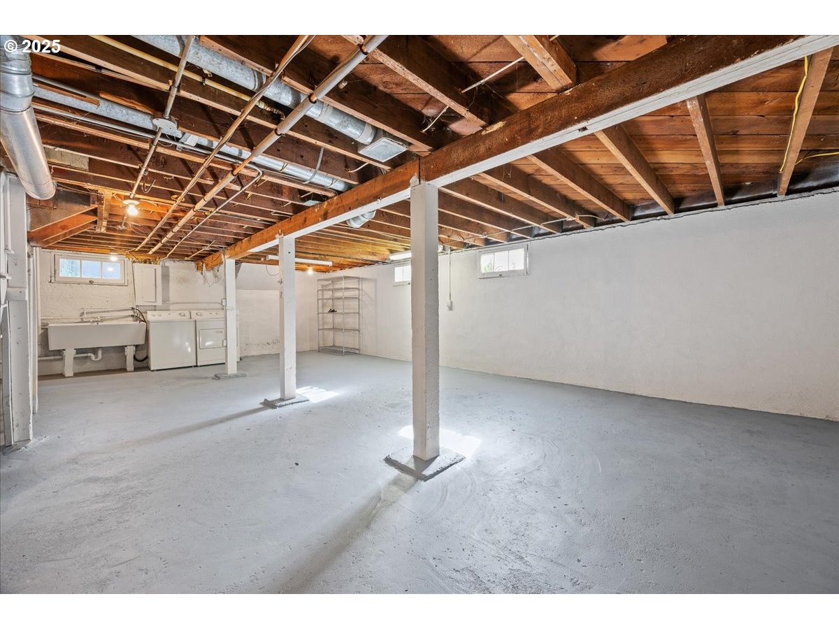 3448 Southeast Sherman Street Portland, OR 97214 - Photo 30 of 40 a view of a room with wooden walls