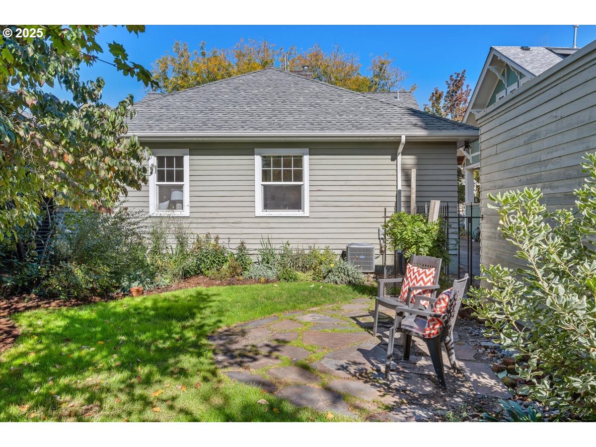 3448 Southeast Sherman Street Portland, OR 97214 - Photo 35 of 40 a view of a house with backyard and sitting area