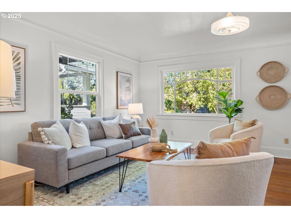 3448 Southeast Sherman Street Portland, OR 97214 - Photo 7 of 40 a living room with furniture and a large window