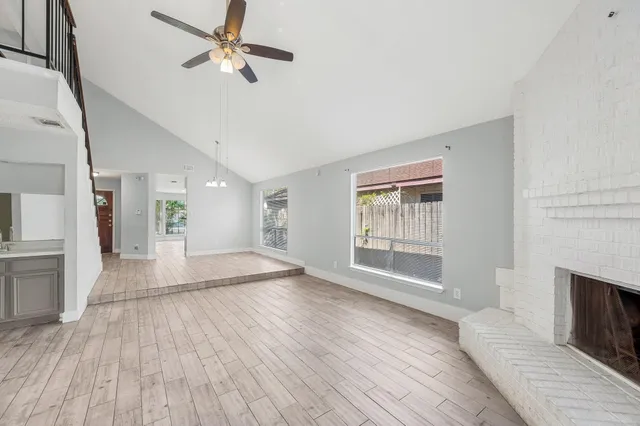 a kitchen with stainless steel appliances granite countertop a stove and a refrigerator