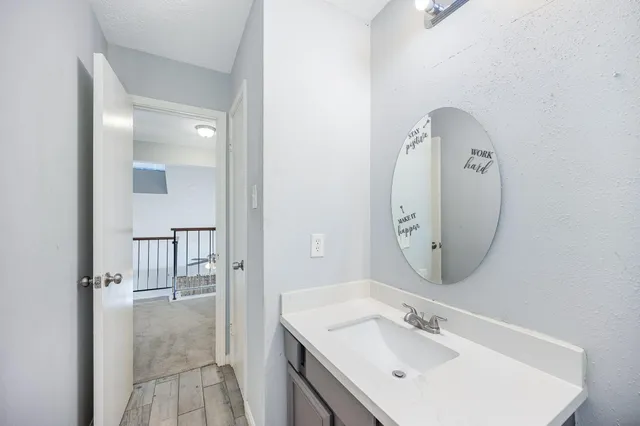 a bathroom with a bathtub and shower