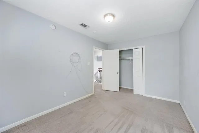 a bathroom with a sink vanity and a mirror