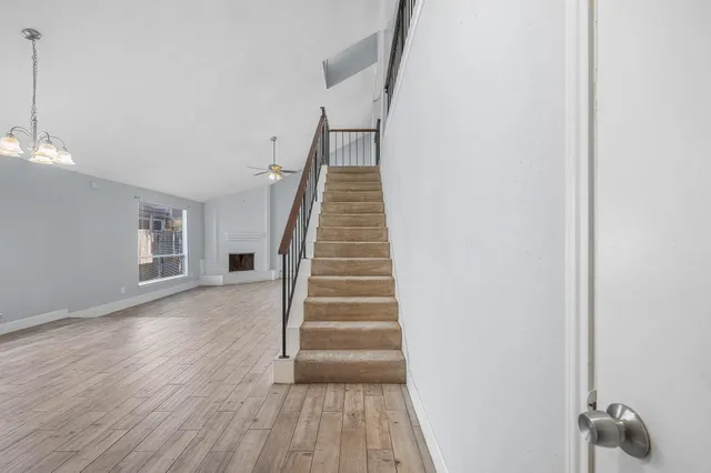a view of entryway with wooden floor