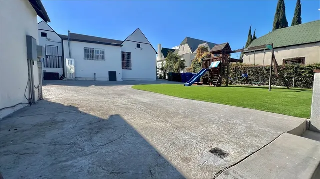 a house view with a garden space