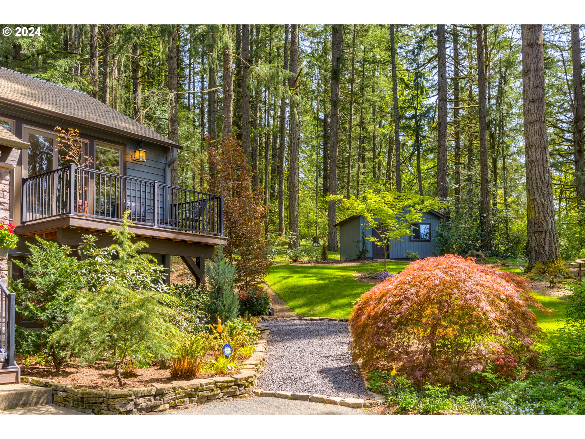20828 South Mattoon Road Estacada, OR 97023 - Photo 8 of 48 a view of a backyard with plants