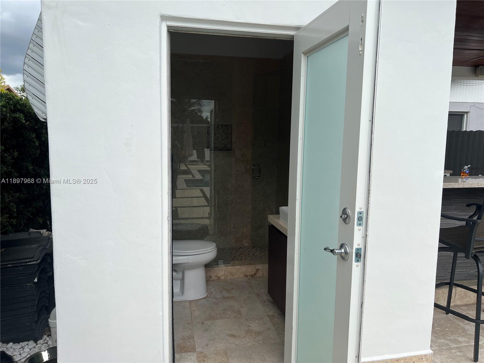 3530 Southwest 126th Avenue Miami, FL 33175 - Photo 17 of 58 a bathroom with a toilet and a shower