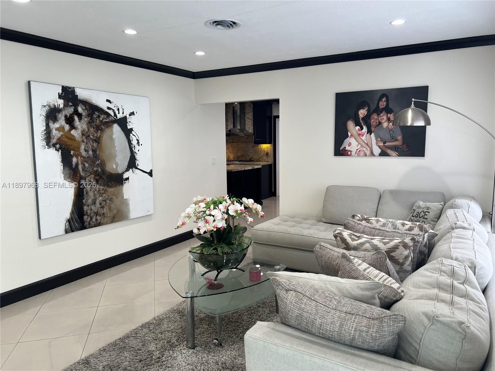 3530 Southwest 126th Avenue Miami, FL 33175 - Photo 22 of 52 a living room with furniture flowerpot and a potted plant