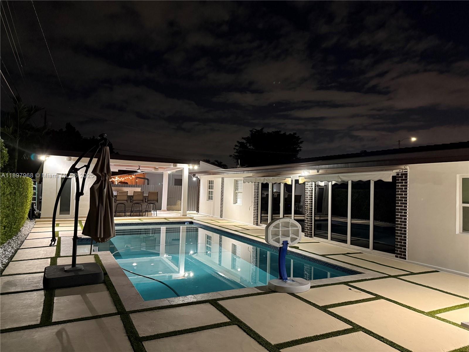 3530 Southwest 126th Avenue Miami, FL 33175 - Photo 24 of 58 a view of a porch with furniture and floor to ceiling window