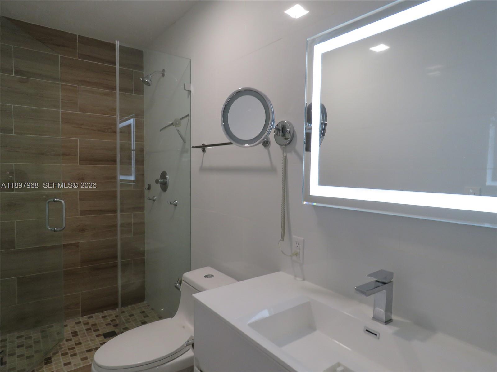 3530 Southwest 126th Avenue Miami, FL 33175 - Photo 27 of 52 a bathroom with a sink toilet and shower