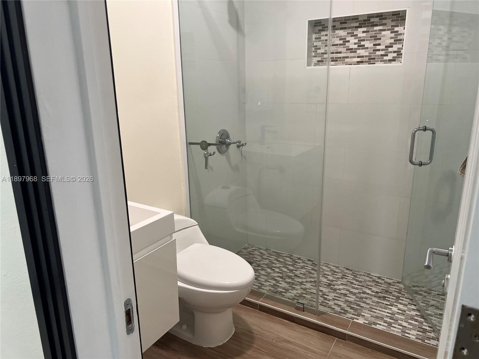 3530 Southwest 126th Avenue Miami, FL 33175 - Photo 30 of 52 a bathroom with a toilet and a shower