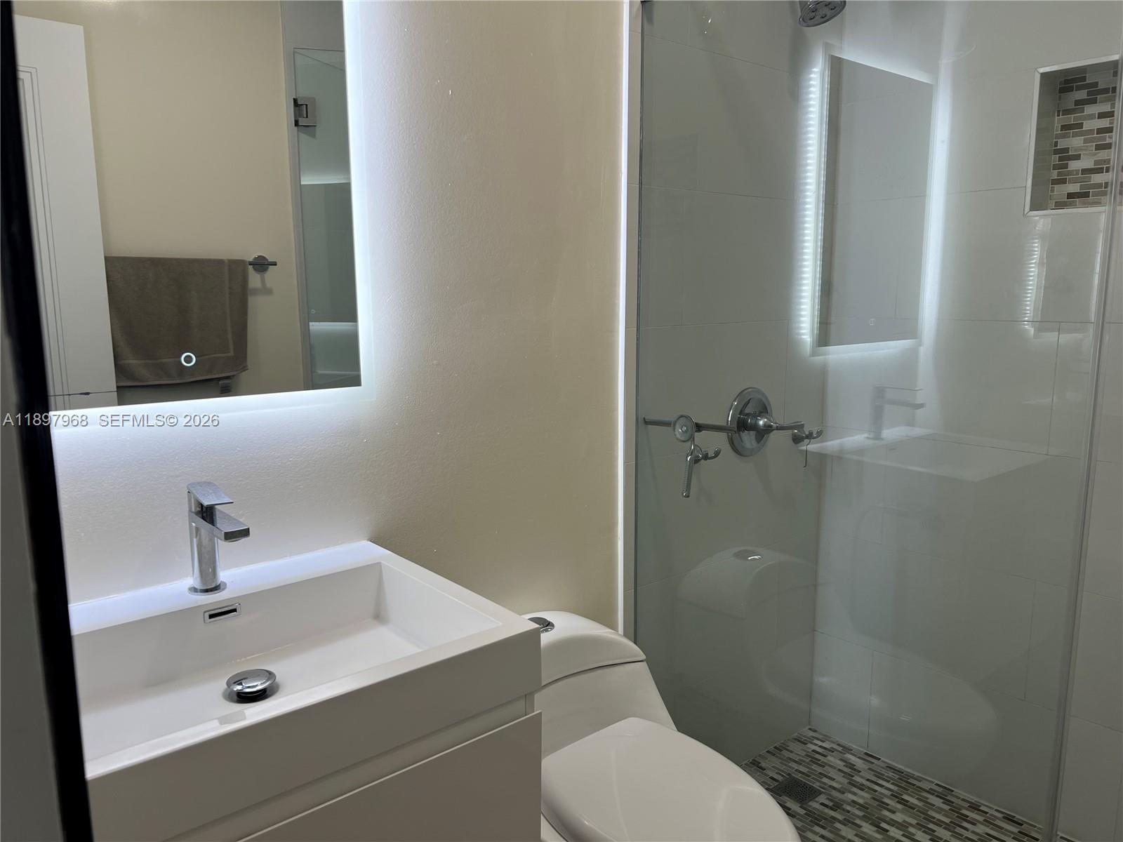 3530 Southwest 126th Avenue Miami, FL 33175 - Photo 31 of 52 a bathroom with a sink a toilet and shower