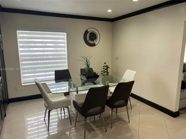 an aerial view of houses with outdoor space