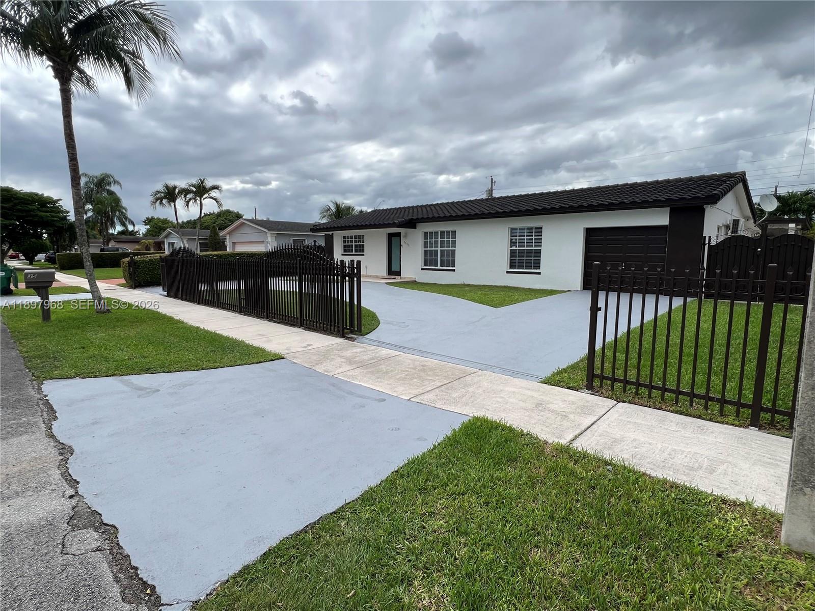 3530 Southwest 126th Avenue Miami, FL 33175 - Photo 5 of 52 a view of a backyard with a garden