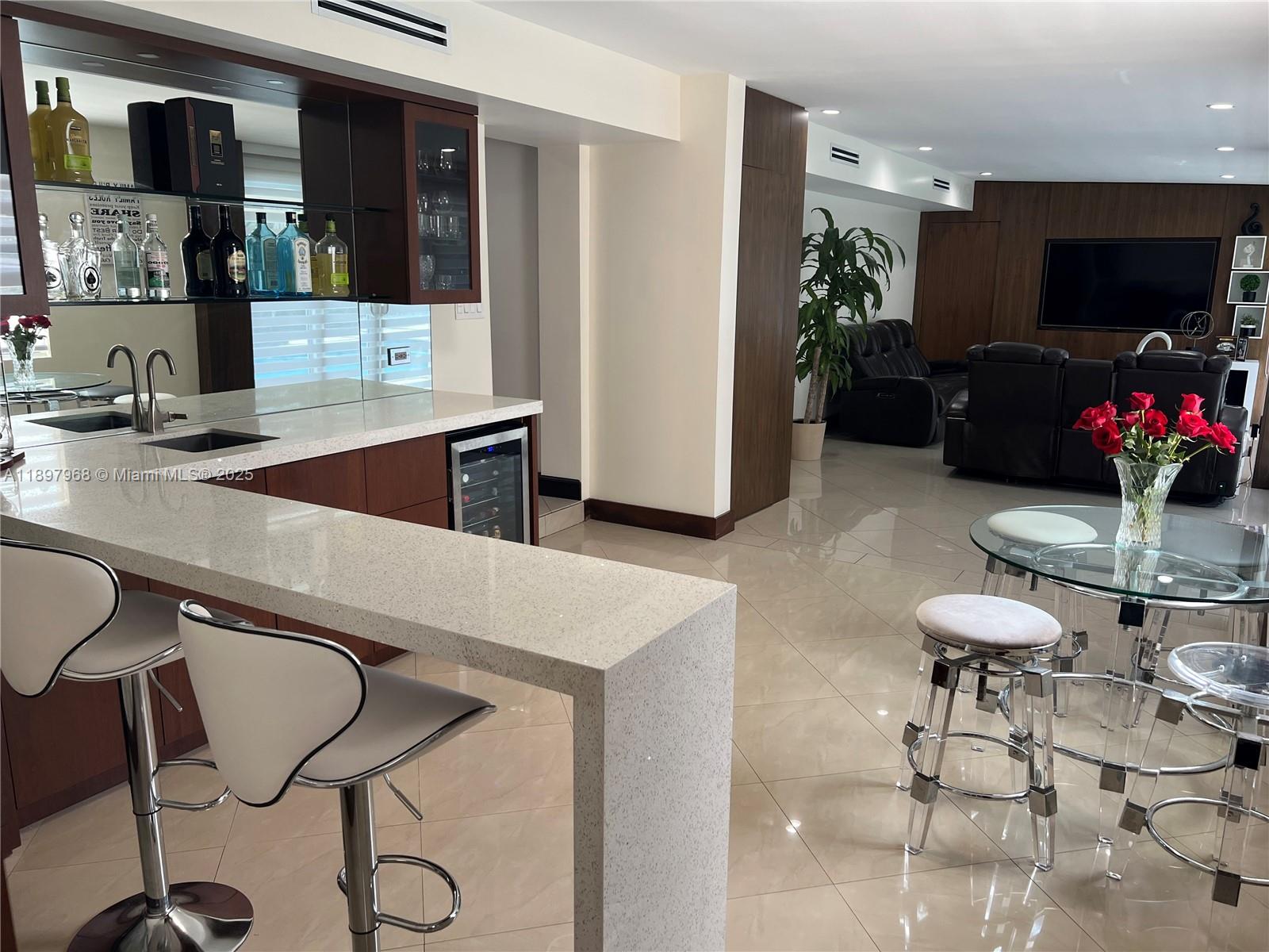 3530 Southwest 126th Avenue Miami, FL 33175 - Photo 52 of 58 a kitchen with a table and chairs