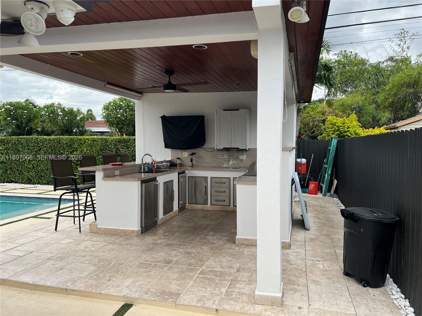 3530 Southwest 126th Avenue Miami, FL 33175 - Photo 8 of 52 a view of a kitchen with a fireplace and a fireplace