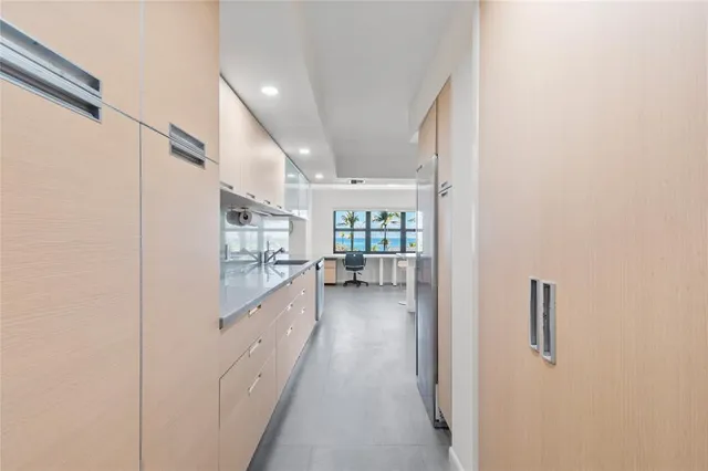 a view of balcony with wooden floor