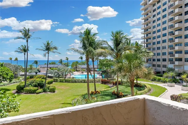 a view of a room with wooden floor and city view