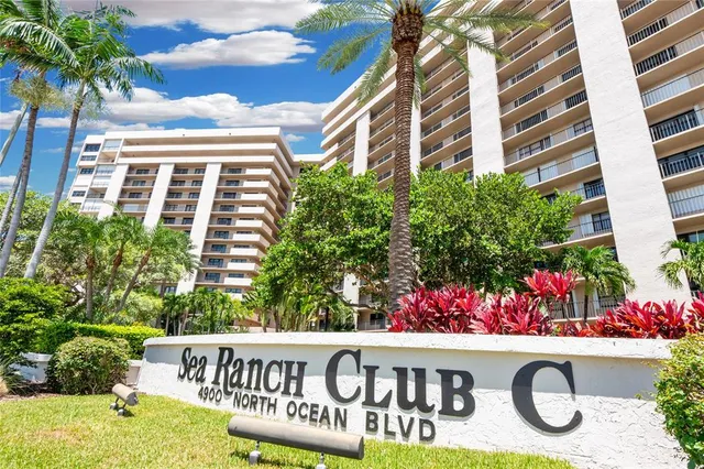 a bed room with furniture and flat screen tv