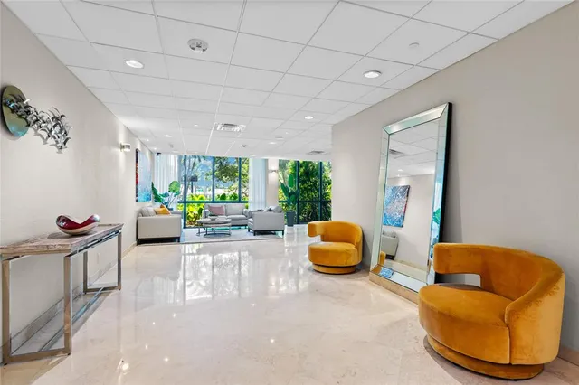 a view of a swimming pool with a yard