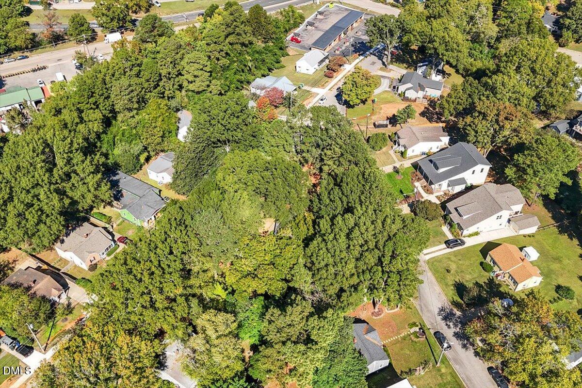 202 Baggett Avenue Raleigh, NC 27604 - Photo 5 of 8 an aerial view of residential houses with yard