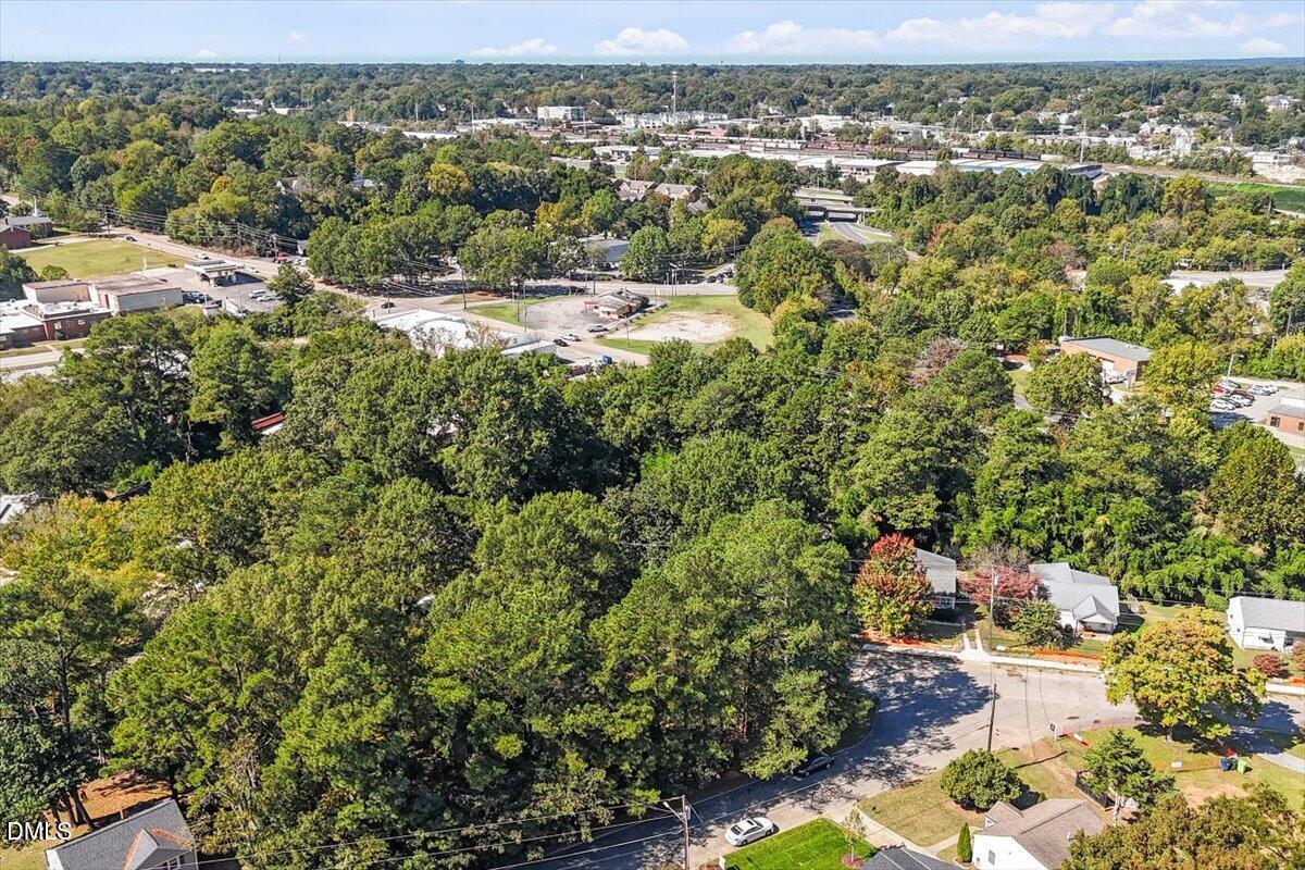 202 Baggett Avenue Raleigh, NC 27604 - Photo 7 of 8 an aerial view of residential houses with outdoor space