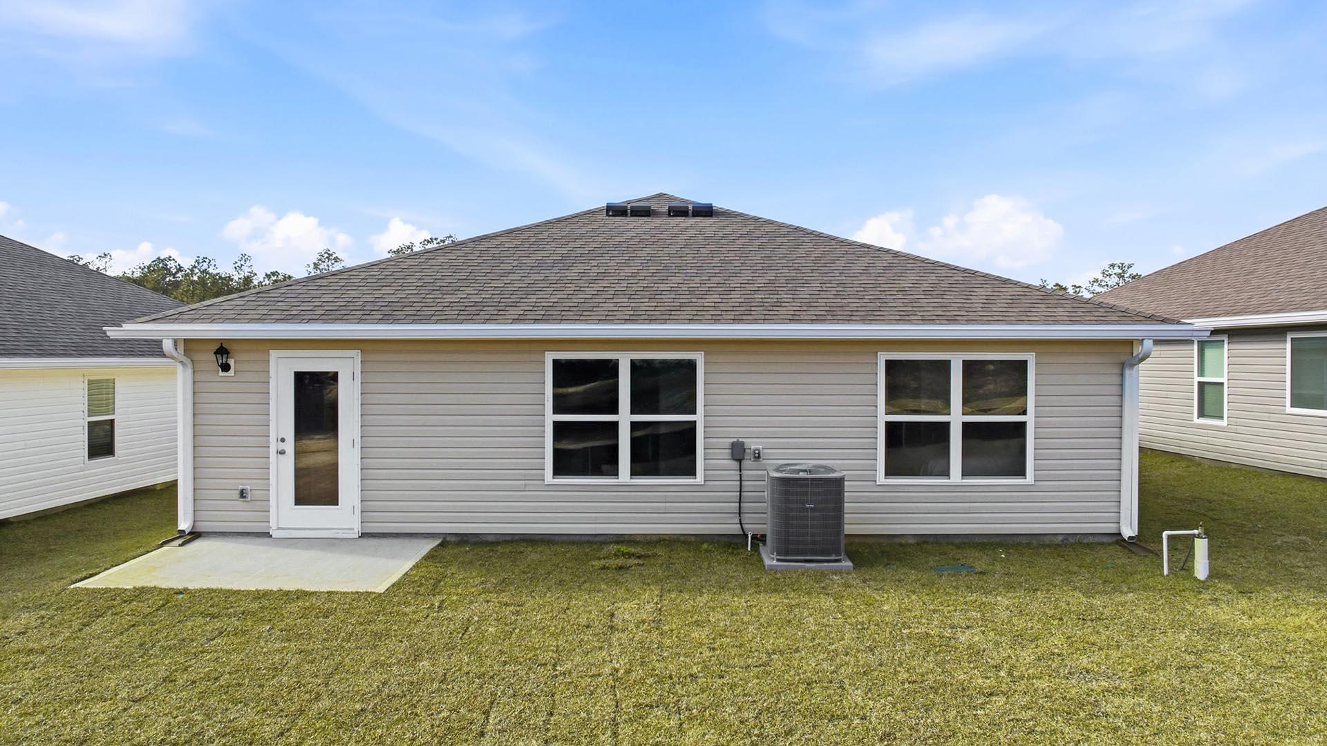 143 Dockside Road Freeport, FL 32439 - Photo 24 of 25 a backyard of a house
