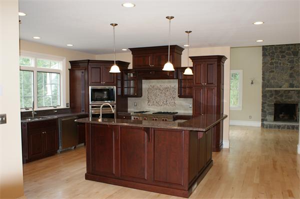 237 Rice Road Wayland, MA 01778 - Photo 5 of 5 a kitchen with stainless steel appliances granite countertop a stove and a wooden floors