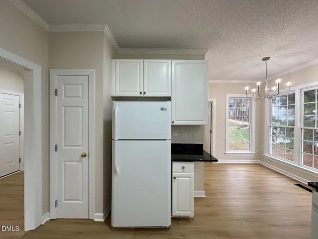a view of livingroom with furniture and wooden floor