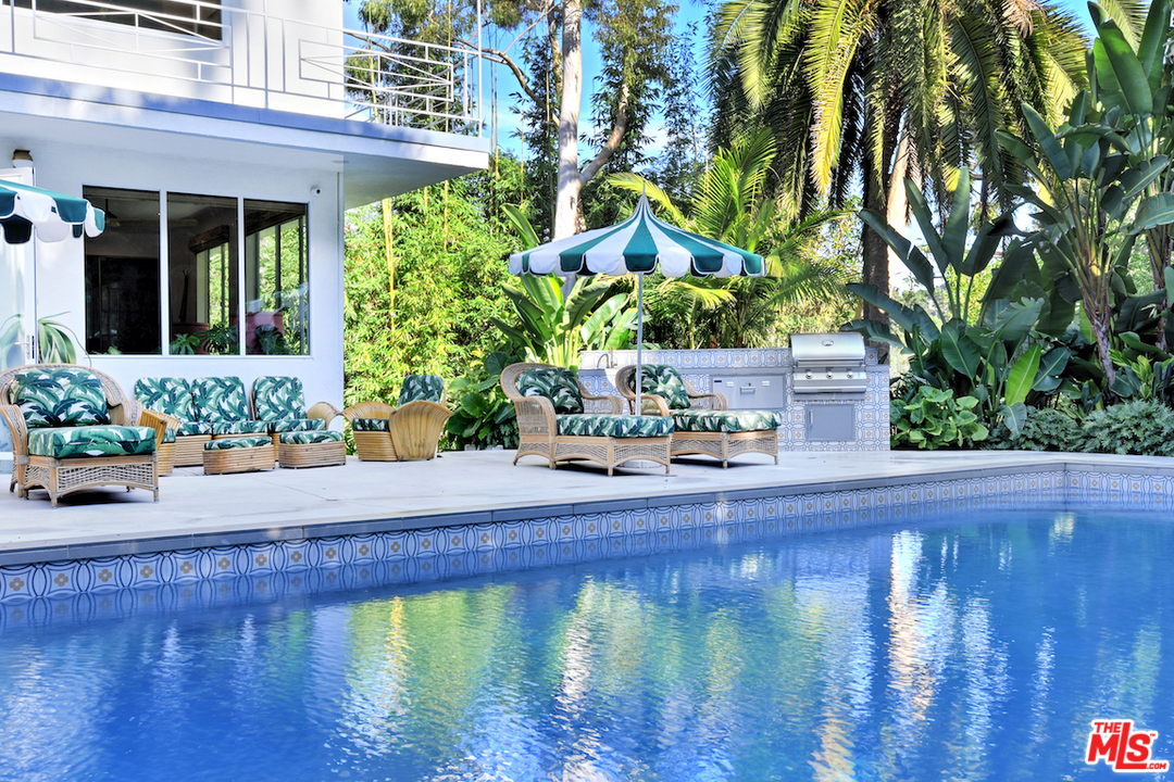 3848 Fredonia Drive Los Angeles, CA 90068 - Photo 2 of 23 a front view of a house with a yard