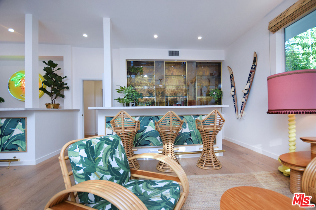 3848 Fredonia Drive Los Angeles, CA 90068 - Photo 13 of 23 a living room with furniture and a wooden floor