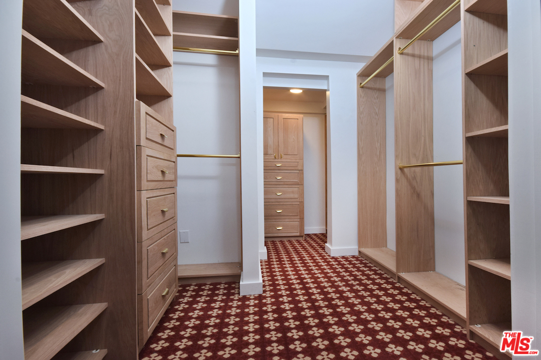 3848 Fredonia Drive Los Angeles, CA 90068 - Photo 16 of 23 a walk in closet with wooden floor