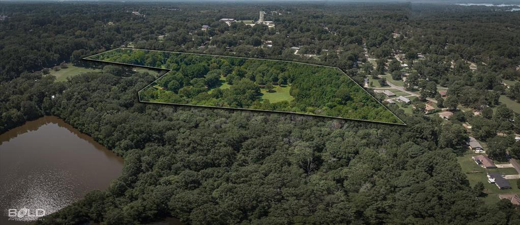 5844 Jefferson Paige Road Shreveport, LA 71119 - Photo 13 of 16 an aerial view of residential house with outdoor space