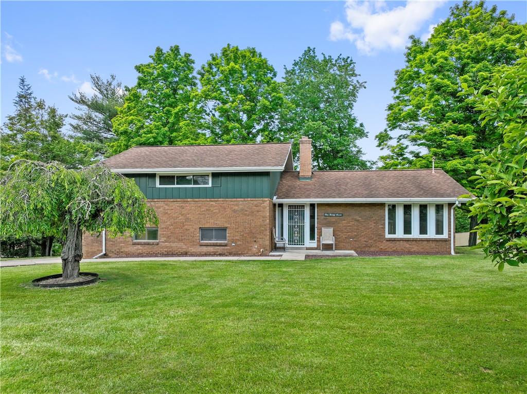 127 Church Road Pittsburgh, PA 15209 - Photo 1 of 35 a view of a house with a yard porch and sitting area