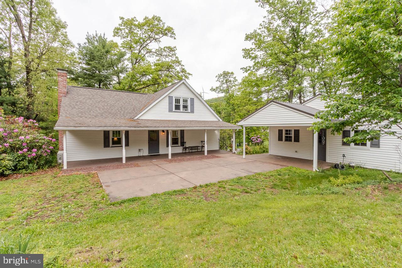 1834 Decker Hollow Road Tyrone, PA 16686 - Photo 6 of 40 a front view of a house with yard patio and green space