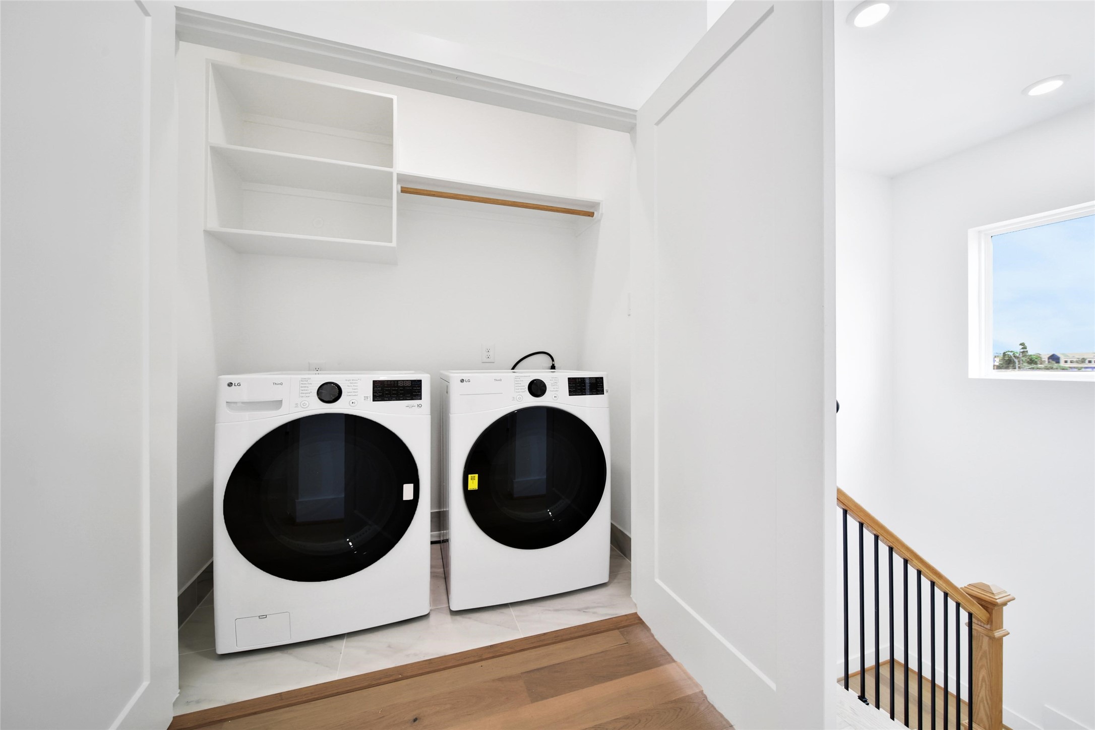 717 Marcella Street, Unit F Houston, TX 77091 - Photo 14 of 37 a utility room with dryer and washer