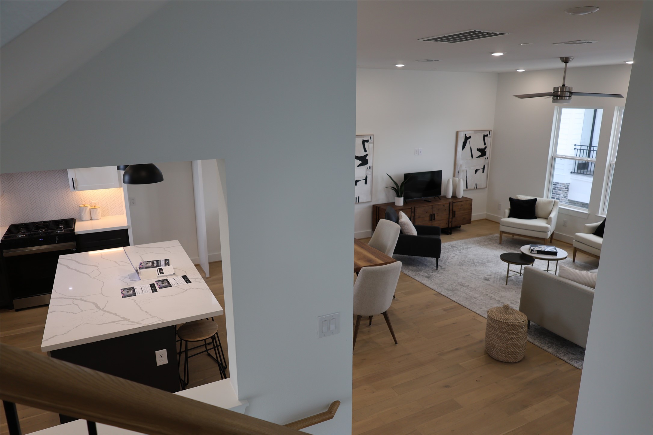 717 Marcella Street, Unit F Houston, TX 77091 - Photo 18 of 37 a living room with furniture and a flat screen tv