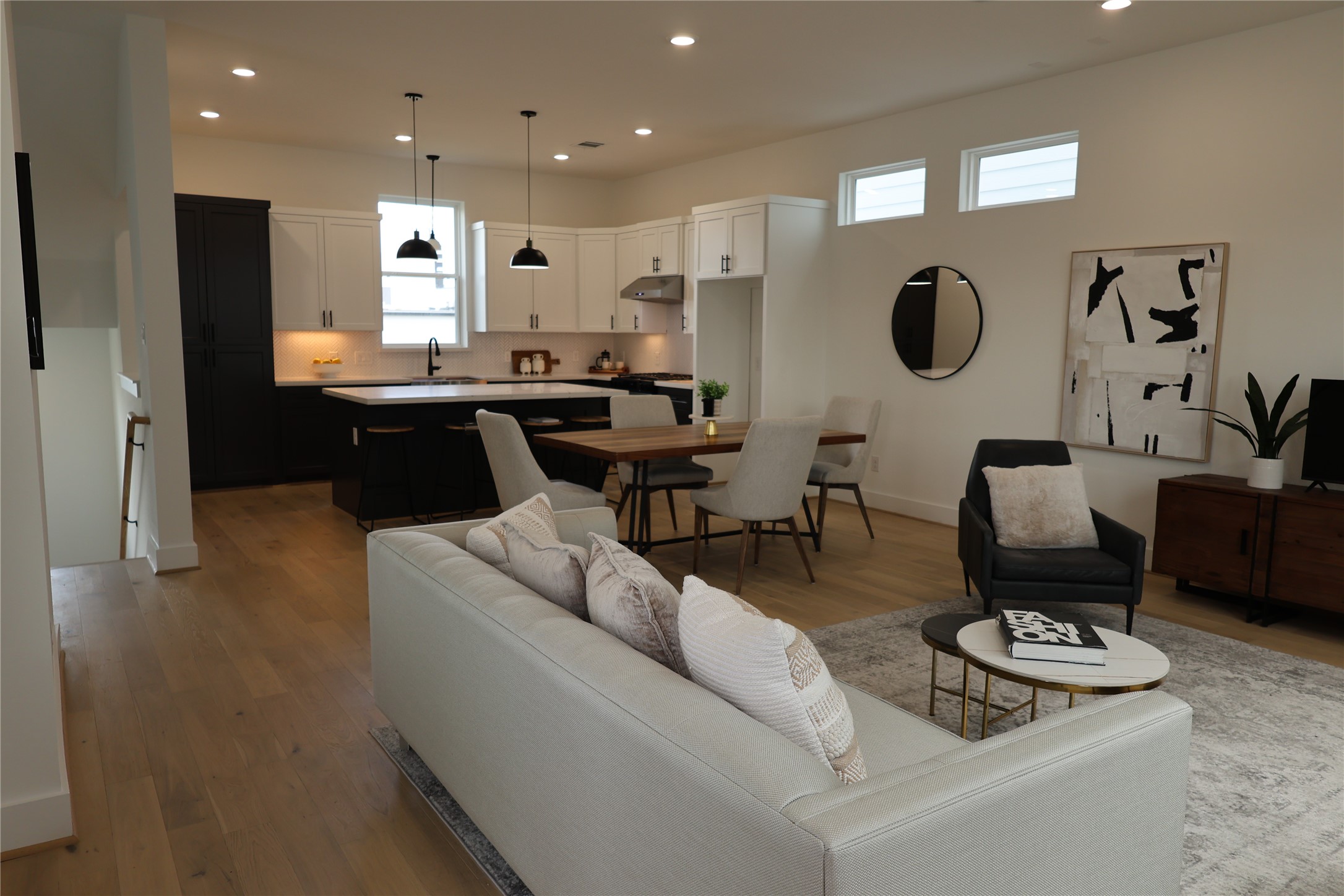 717 Marcella Street, Unit F Houston, TX 77091 - Photo 21 of 37 a living room with furniture and a wooden floor