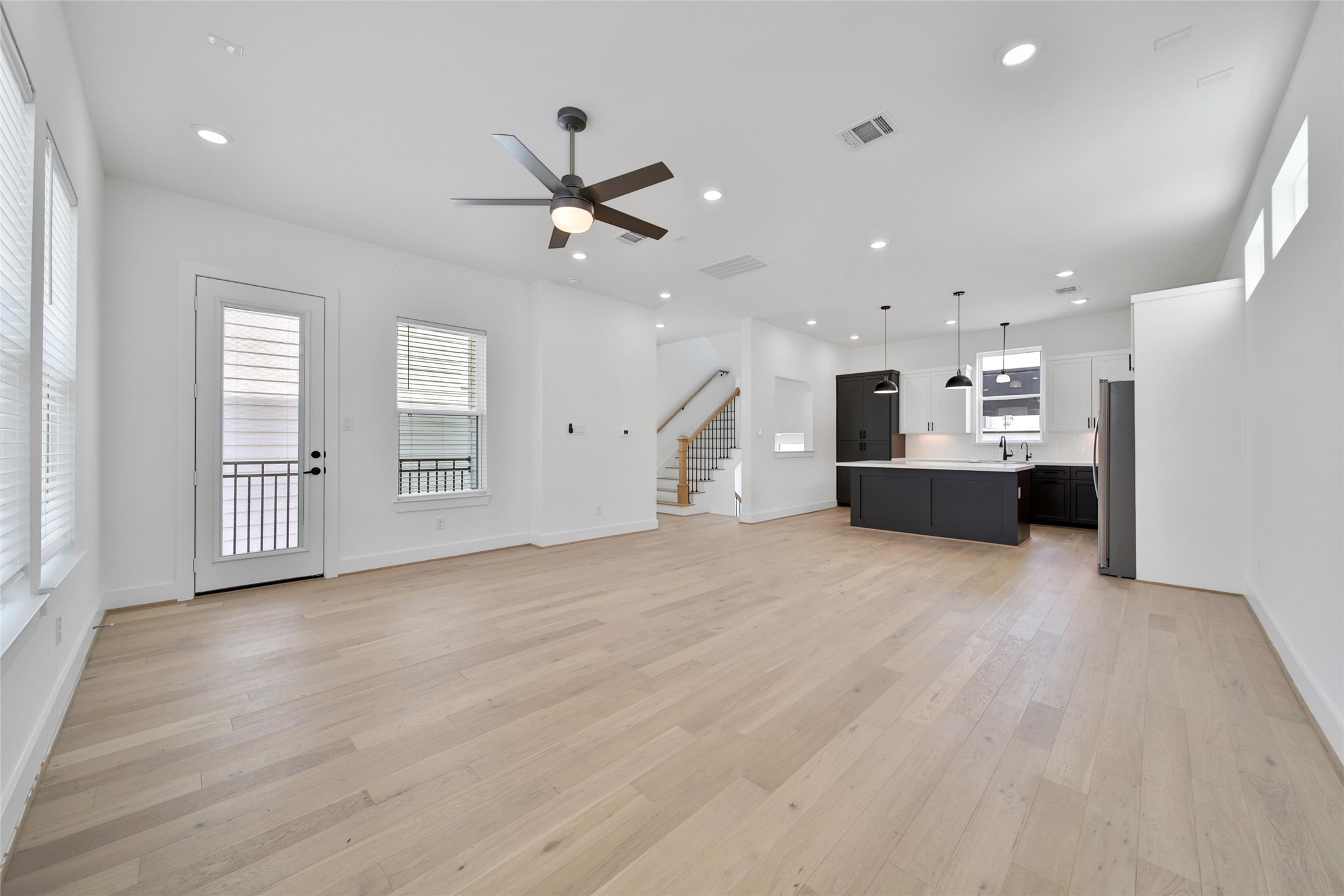 717 Marcella Street, Unit F Houston, TX 77091 - Photo 24 of 37 a view of a kitchen with a sink and a window