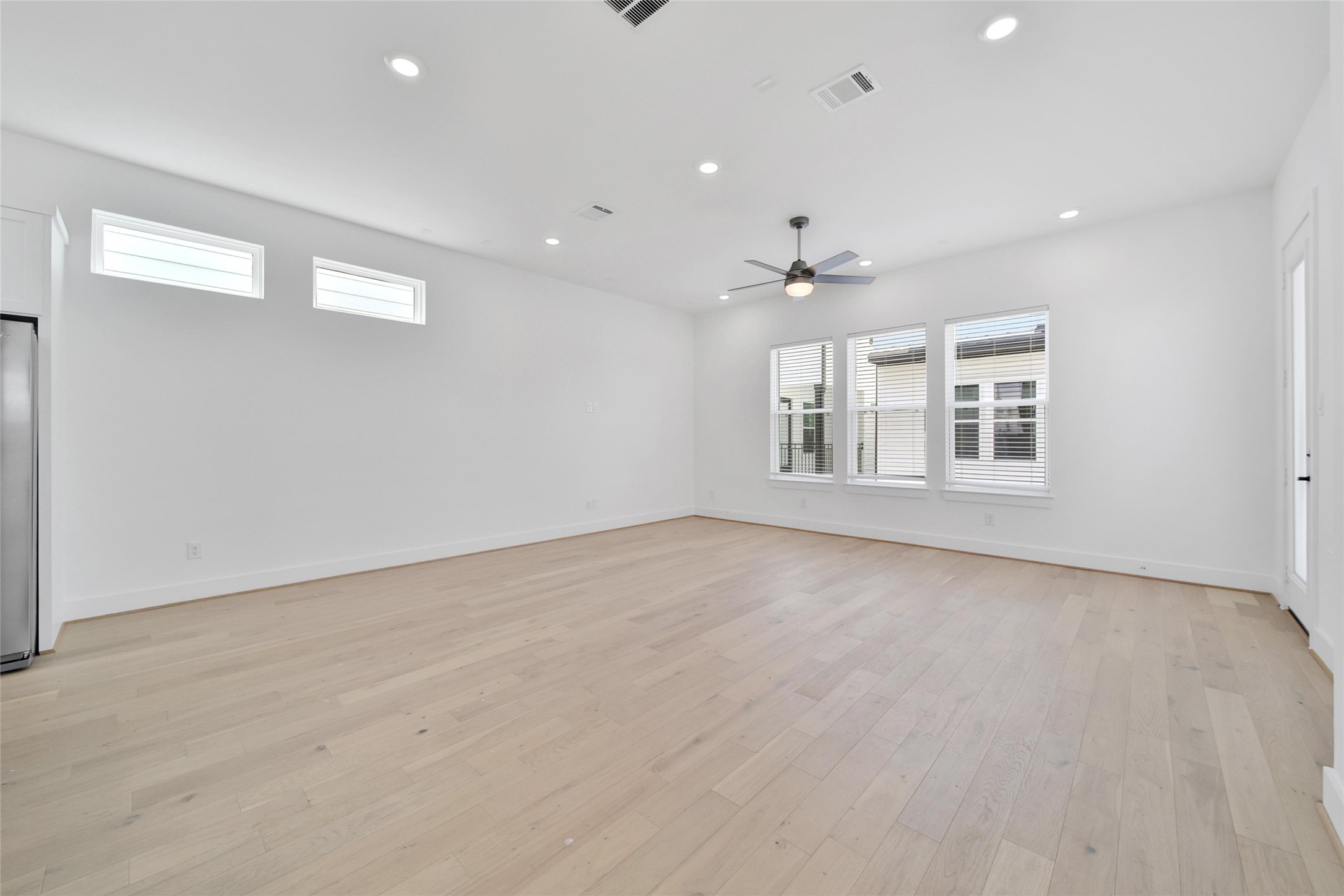 717 Marcella Street, Unit F Houston, TX 77091 - Photo 25 of 37 a view of an empty room with a window