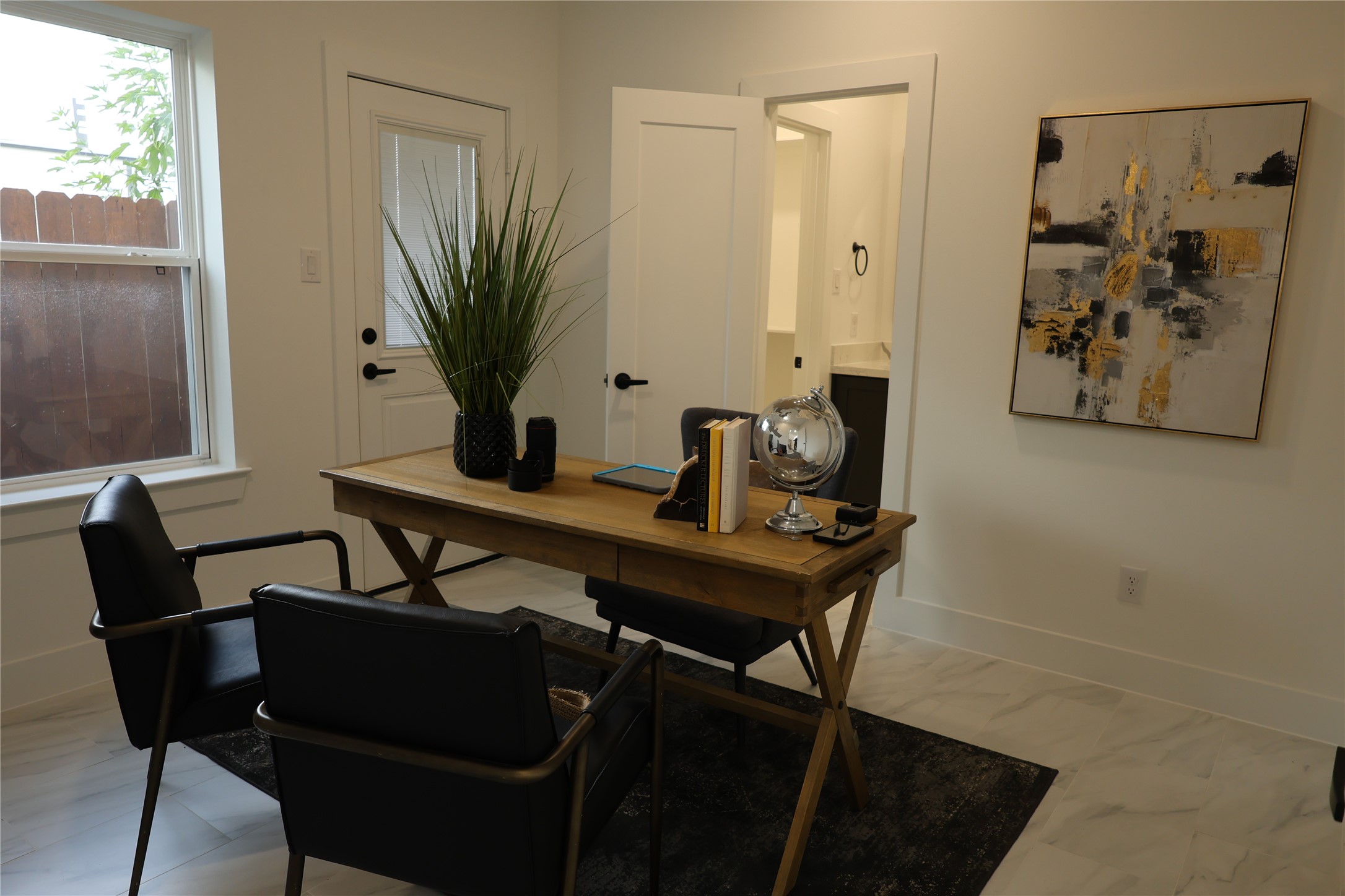 717 Marcella Street, Unit F Houston, TX 77091 - Photo 29 of 37 a view of a workspace with furniture