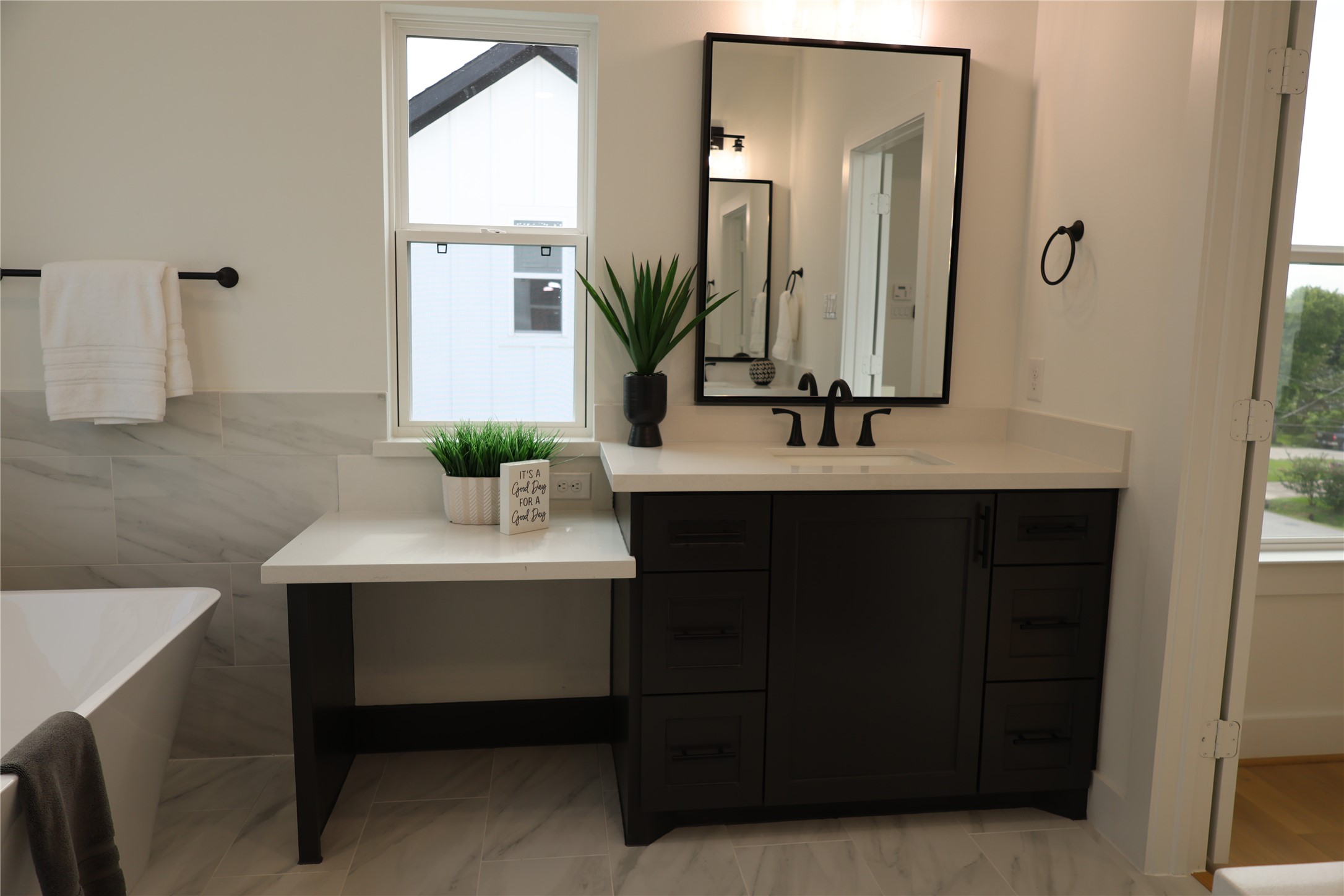 717 Marcella Street, Unit F Houston, TX 77091 - Photo 8 of 37 a bathroom with a sink and a mirror