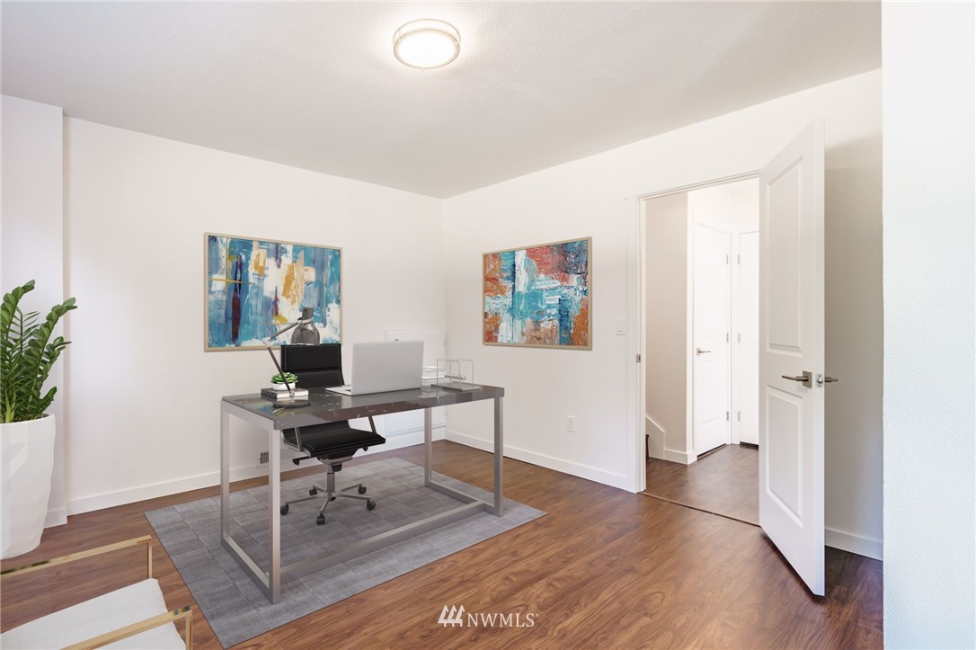 1620 Index Avenue Southeast Renton, WA 98058 - Photo 17 of 39 a workspace with furniture and wooden floor