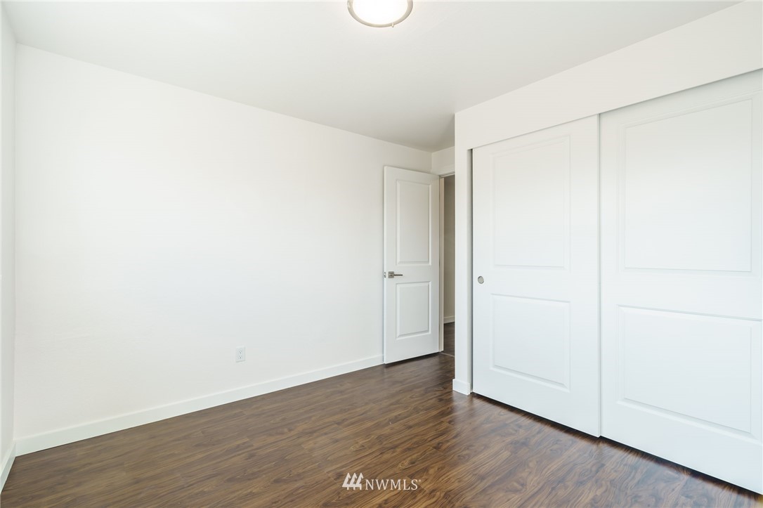 1620 Index Avenue Southeast Renton, WA 98058 - Photo 25 of 39 a view of an empty room with wooden floor
