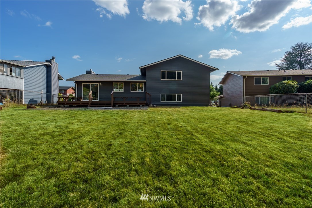 1620 Index Avenue Southeast Renton, WA 98058 - Photo 36 of 39 a view of a house with a yard