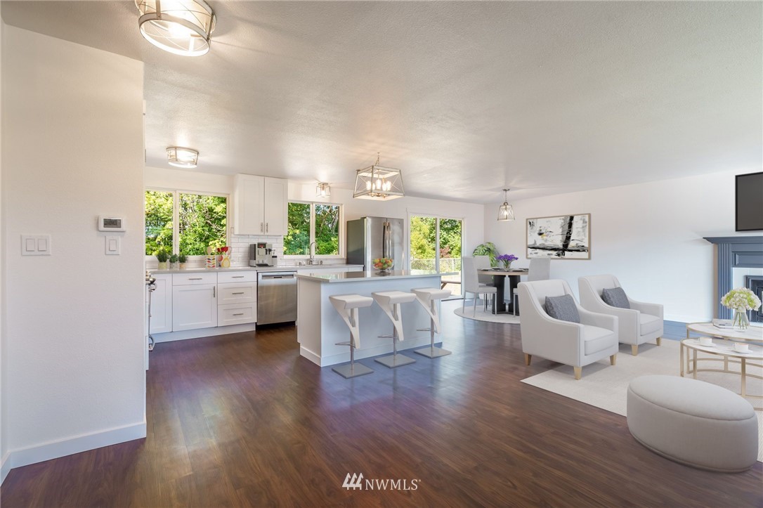 1620 Index Avenue Southeast Renton, WA 98058 - Photo 10 of 39 a living room with furniture and a large window