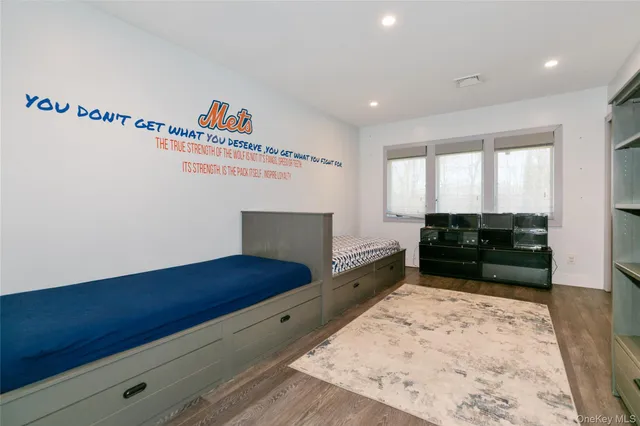 a room with furniture and a rug